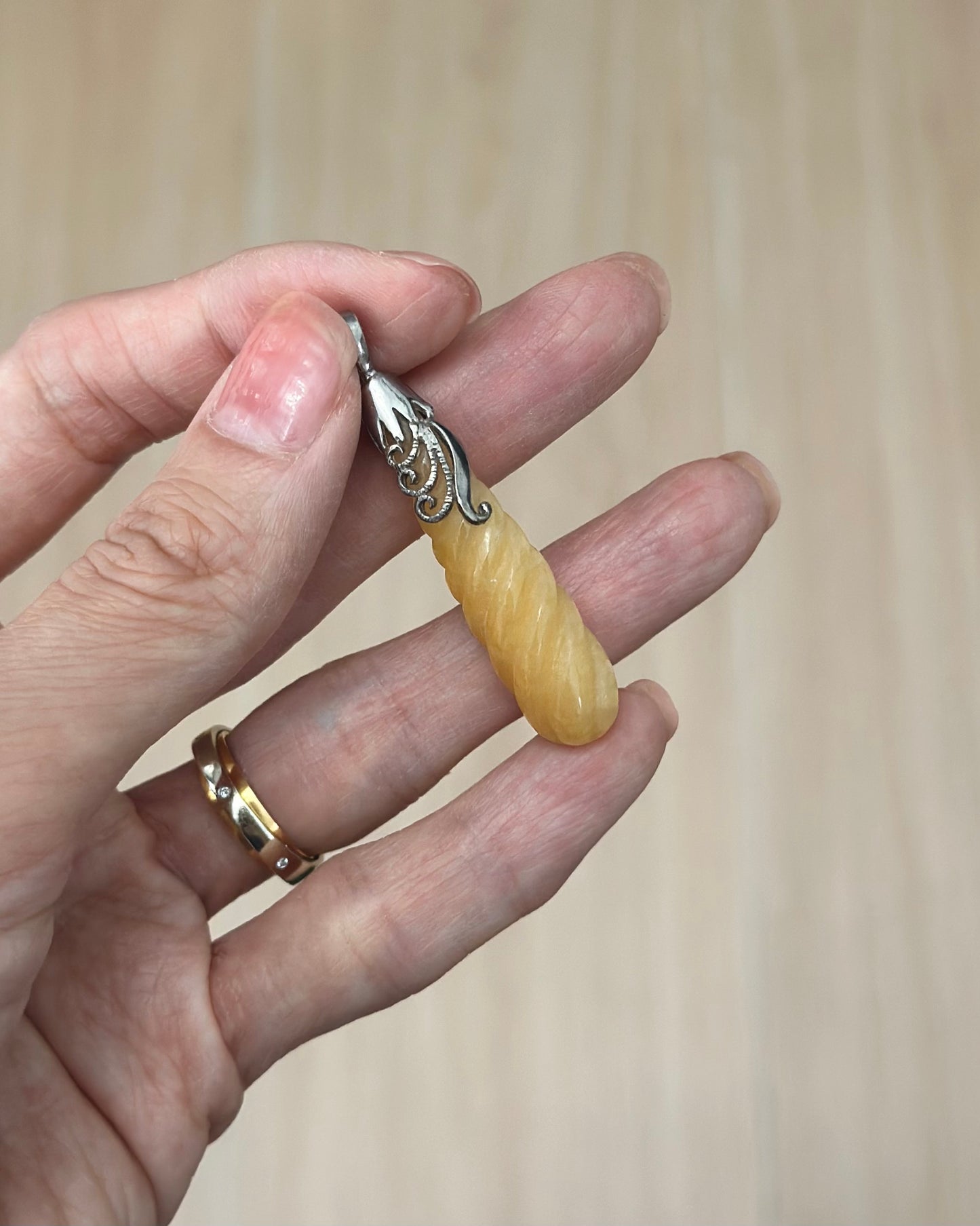 Yellow Calcite Twisted Teardrop Sterling Silver Pendant