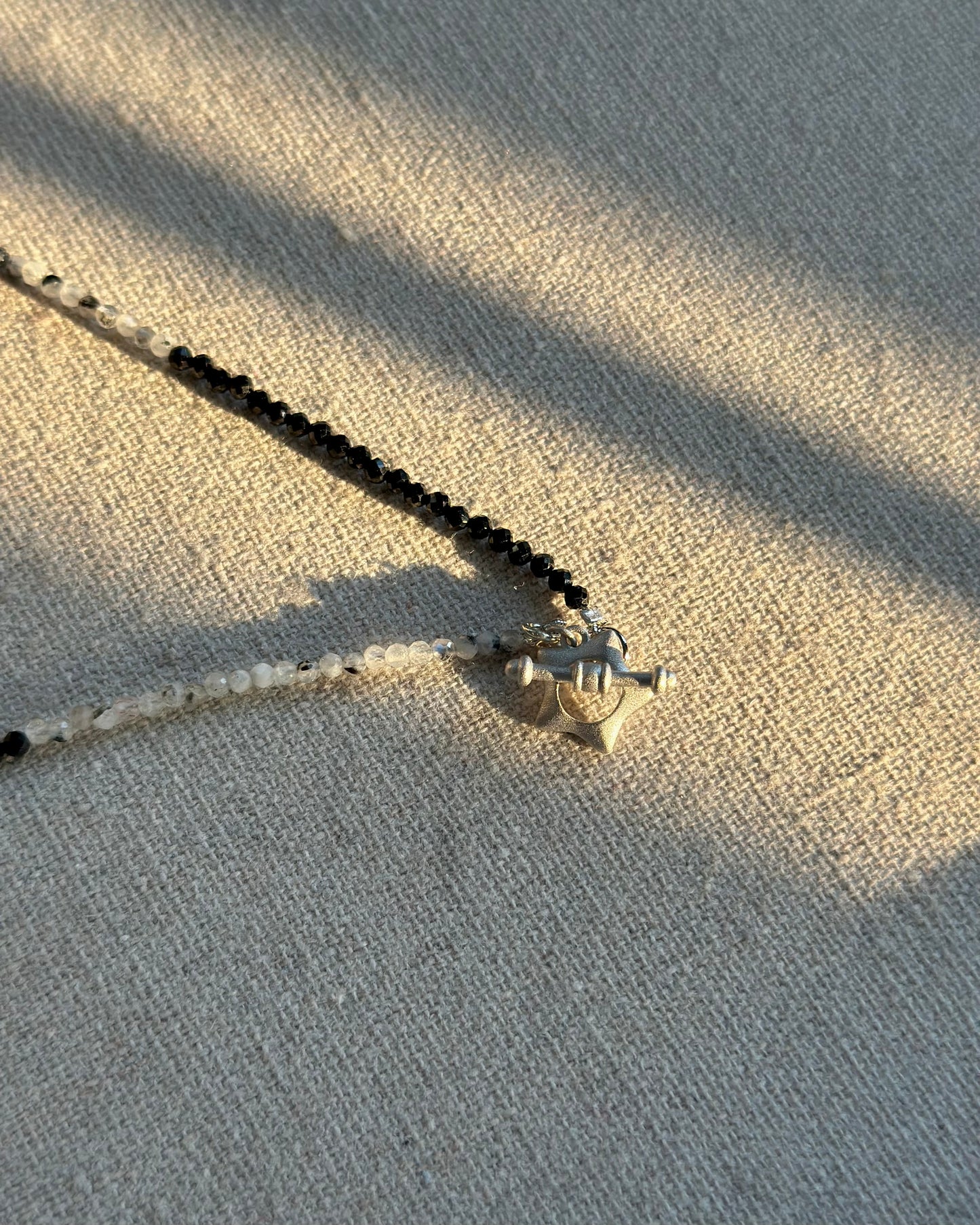 Moonstone And Black Spinel Beaded Front Hoop Toggle Necklace