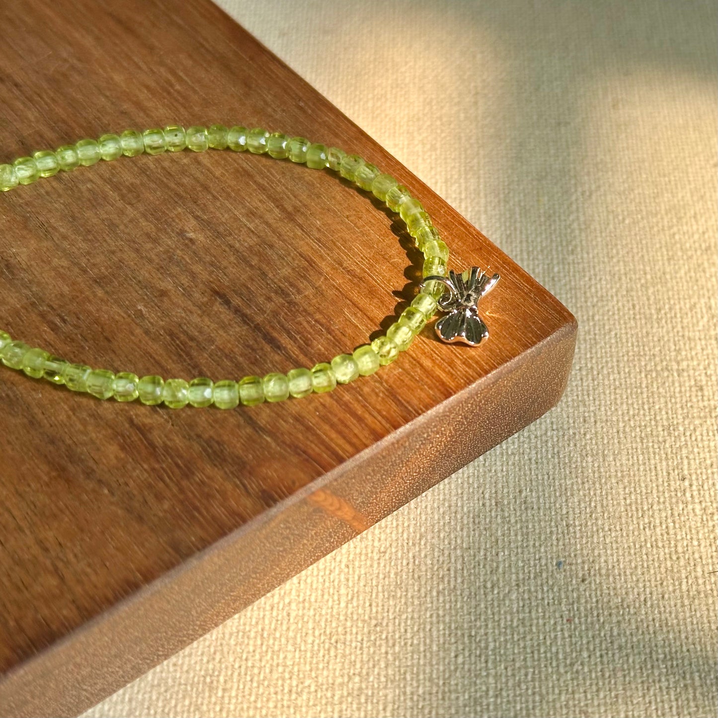 Peridot Beaded And Bow Bracelet