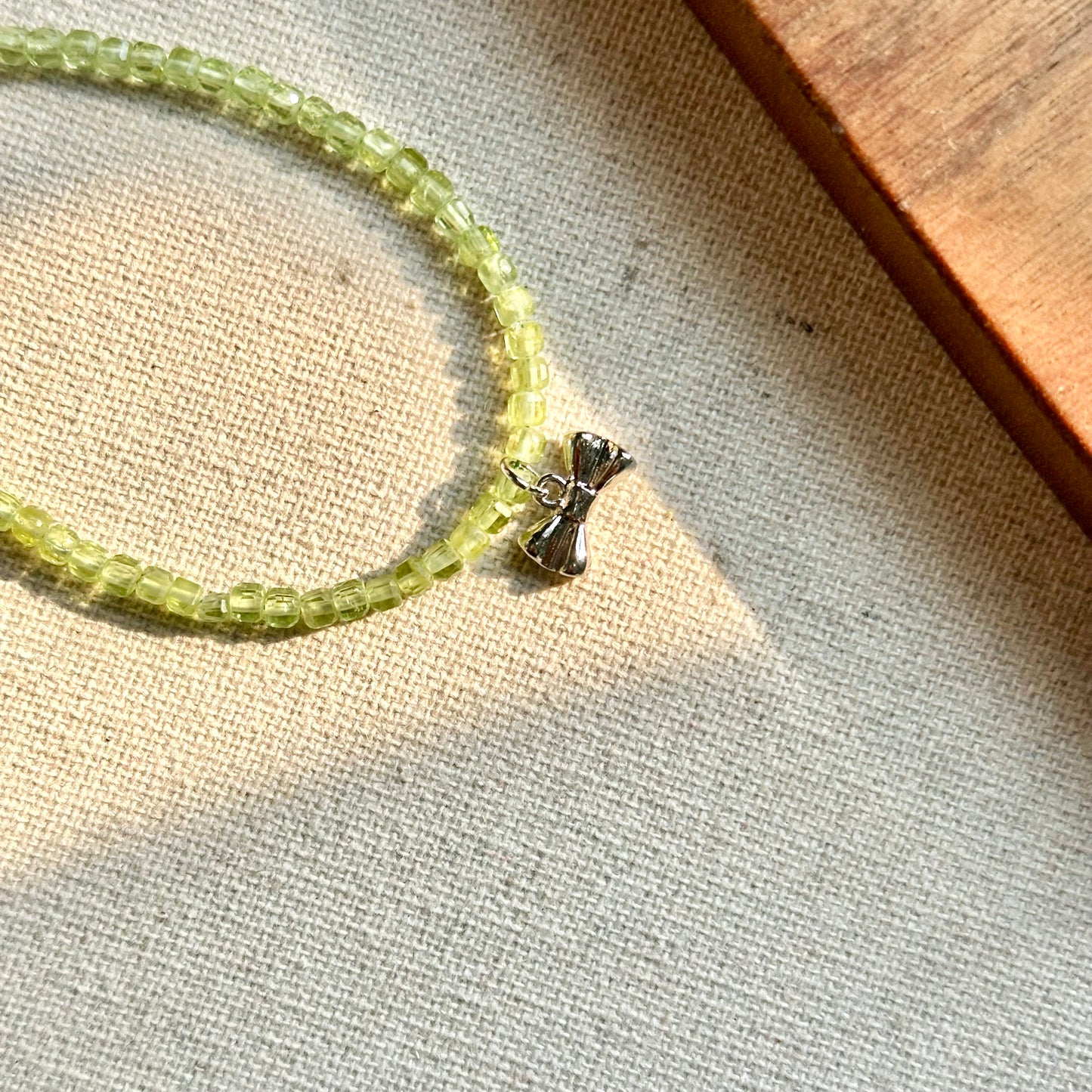 Peridot Beaded And Bow Bracelet