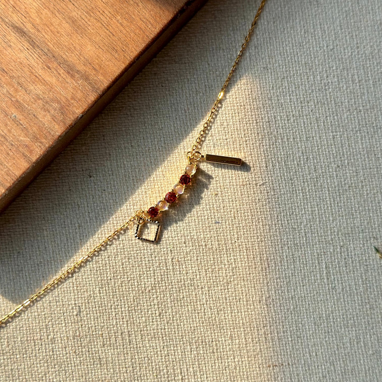 Garnet And Moonstone Curved Gold-plated Necklace